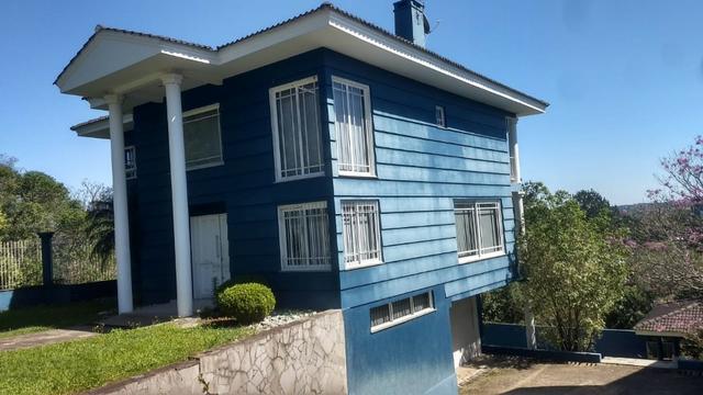 Taquara-Casa com 3 dormitórios e piscina-centro