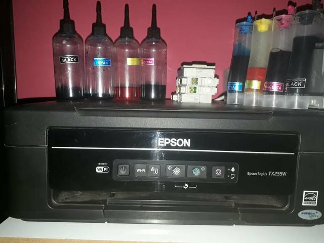 Epson tx 235w com defeito