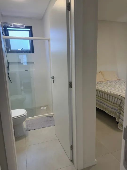 Apartamento Temporada - novo , duas quadras do mar, acomoda até 8 pessoas. - Foto 3