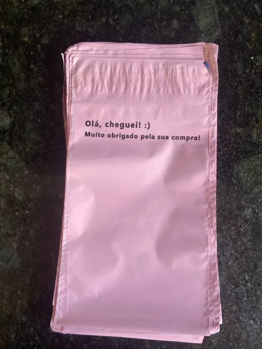 Envelope plástico rosa para envio de produtos