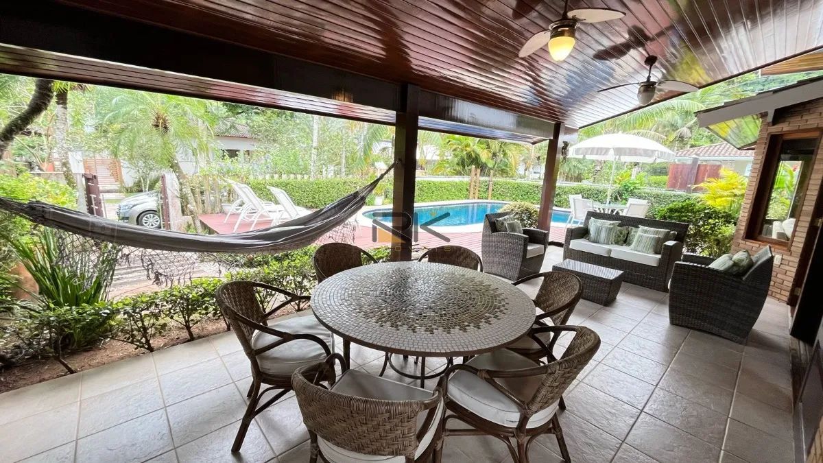 CASA EM CONDOMINIO COM 4 DORMITÓRIOS SENDO 3 SUÍTES,3 VAGAS DE GARAGEM,VARANDA GOURMET COM - Foto 5