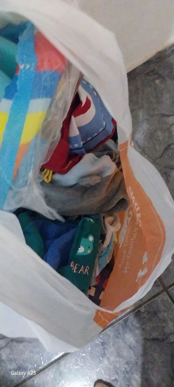 Clothes and an activity mat.. 64166868809730120