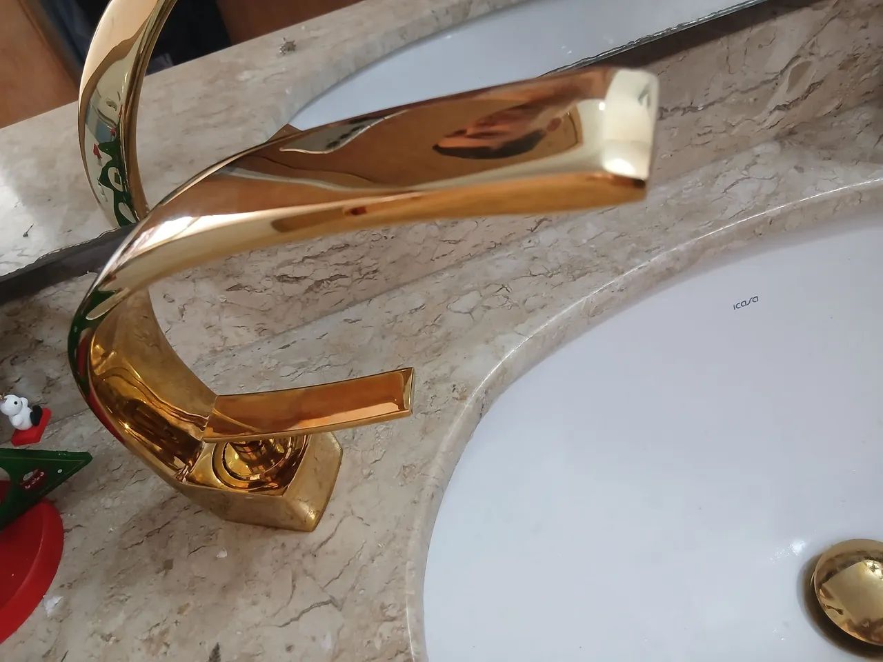 Golden bathroom faucet with mixer