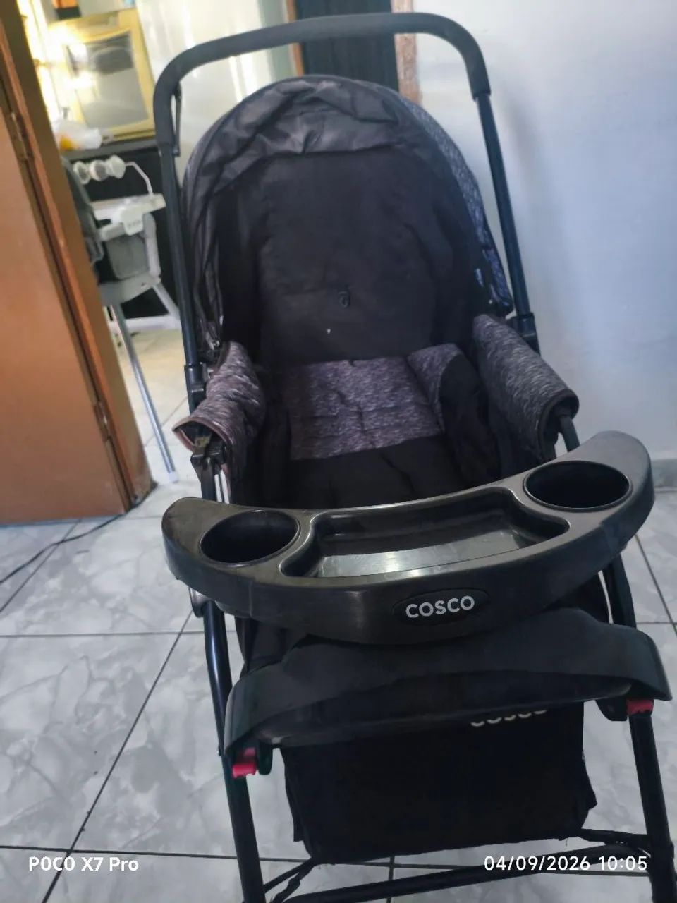 Carrinho de bebê da Cosco 