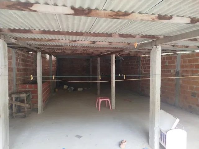 Prédio com duas casas duas garagens e dois salões - Foto 6