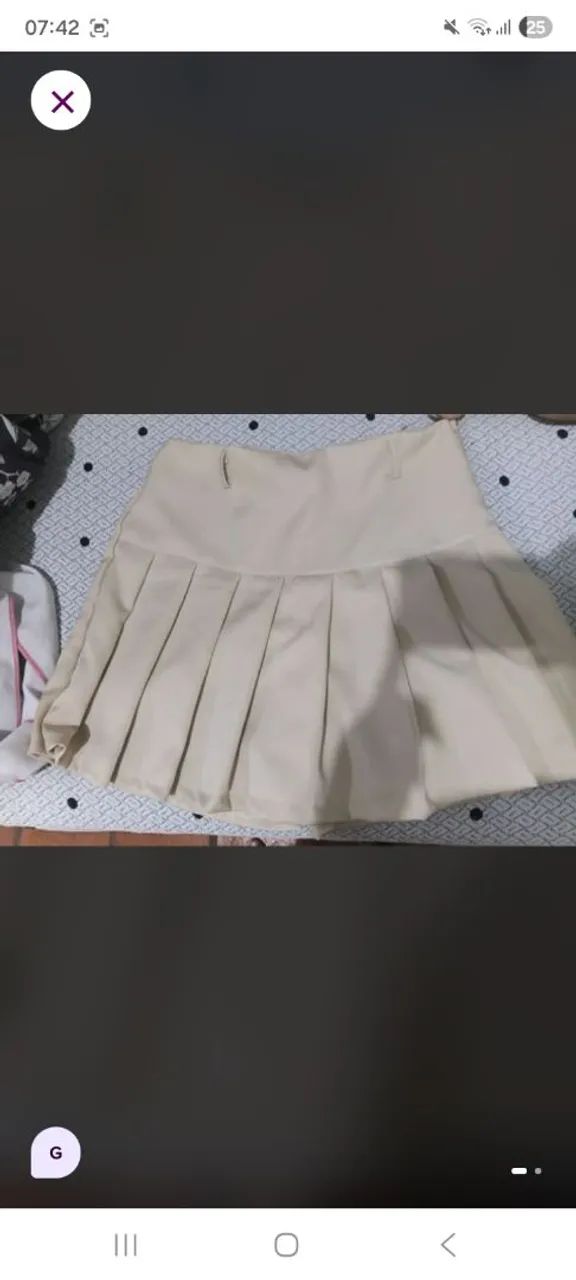 Short saia plissada