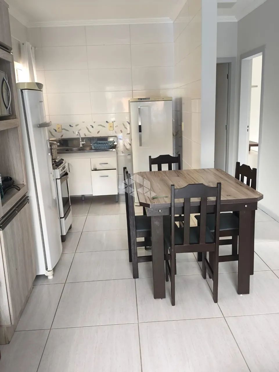 Terreno com casa, 2 apartamentos e kitnet na Barra da Lagoa - Florianópolis - Foto 4