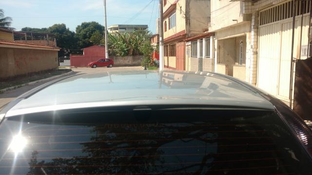 Corsa ar,trava,direção alarme,banco de couro,computador de bordo e roda de liga leve - Foto 9