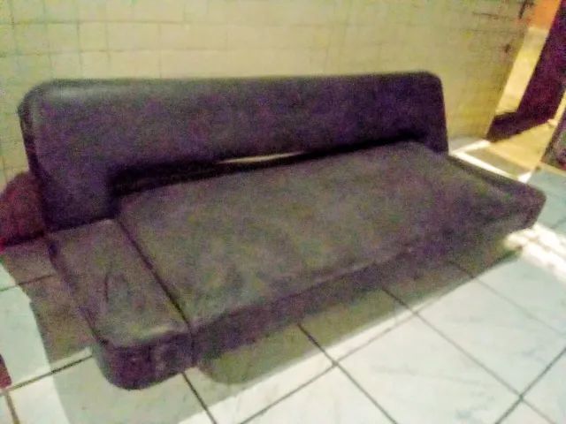 Sofá cama de três lugares
