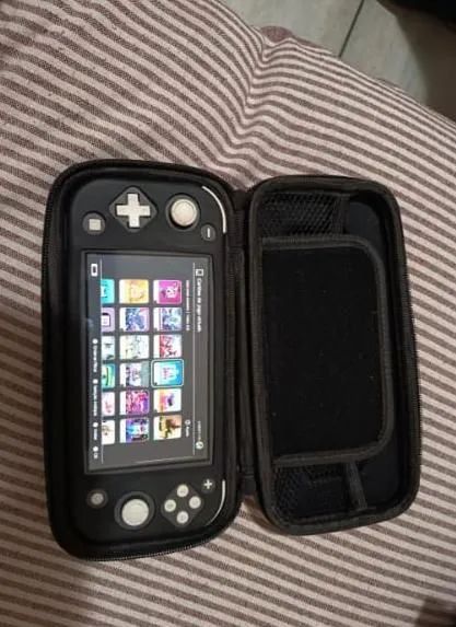 Nintendo switch lite completo - Foto 3