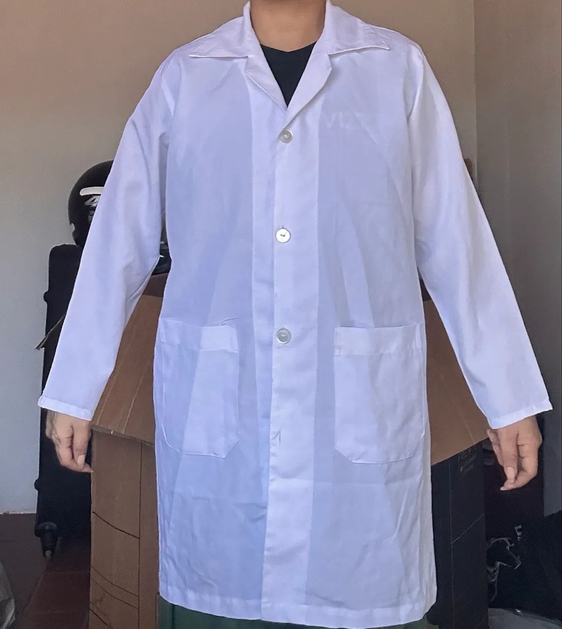 Jaleco branco pequeno