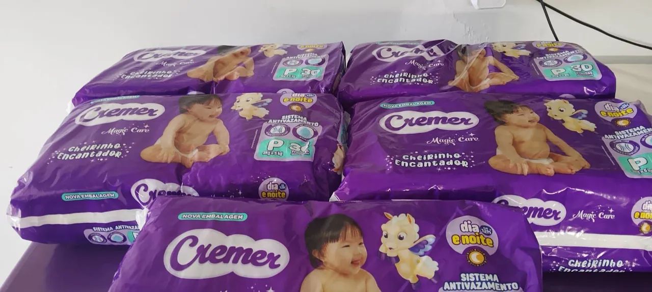 VENDO 5 PACOTE DE FRALDAS 