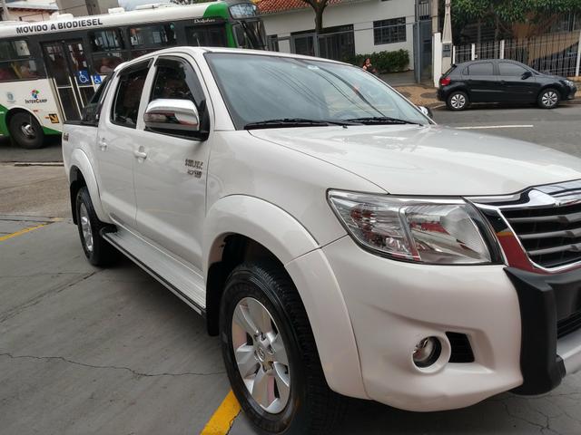 Hilux Srv flex ano 2014 automático - Foto 4
