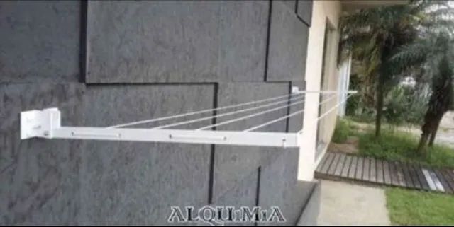 Varal retrátil pra parede - Foto 3