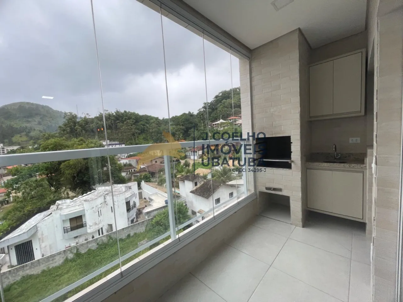 Apartamento à venda com 2 dormitórios e varanda gourmet, Toninhas - Ubatuba