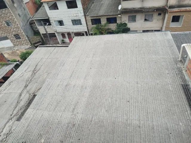 Prédio com duas casas duas garagens e dois salões - Foto 5