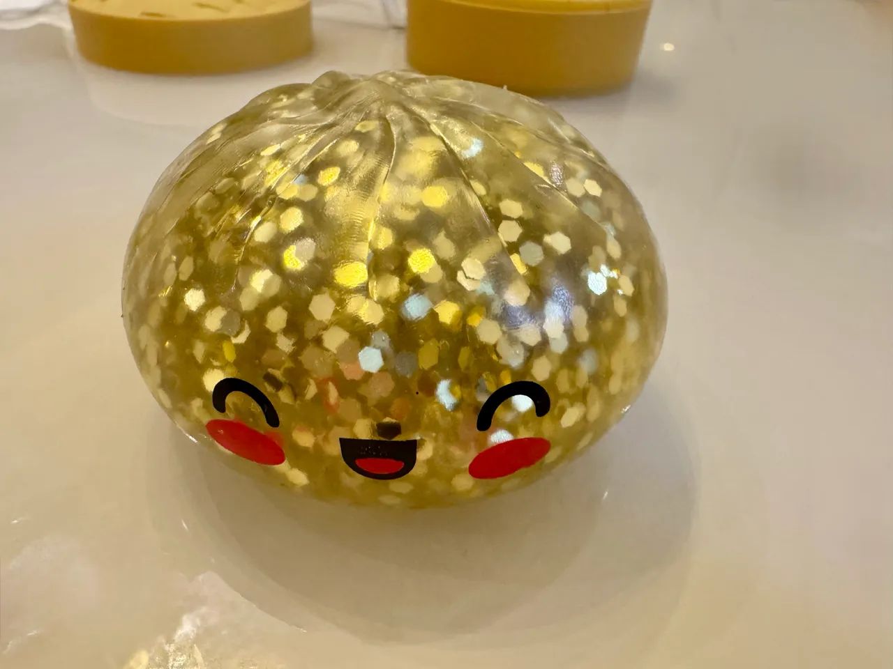 Dumpling squishy Glitter dourado  - Foto 5