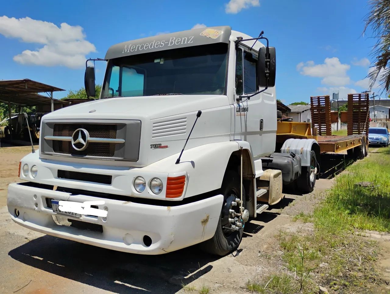 Mercedes  1634 ano 2010 e prancha 2 eixos 87 baixei para vender A VISTA 