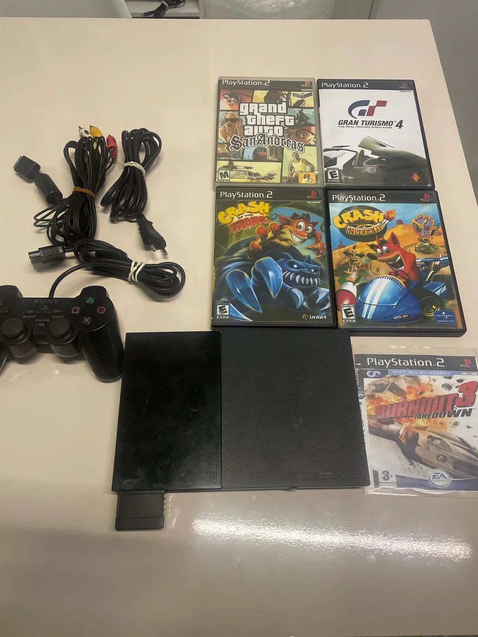 Ps2 com controle original e leitor funcionando 