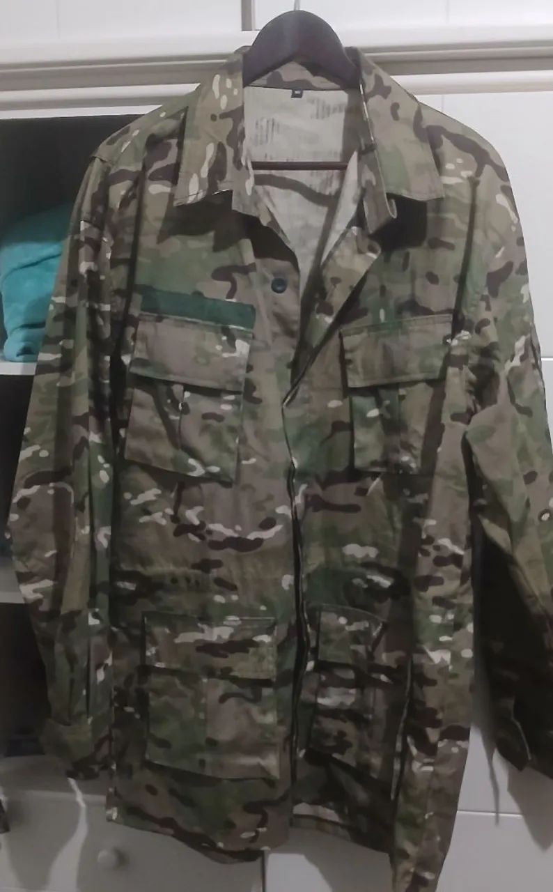Jaqueta camuflada XG maior que GG 