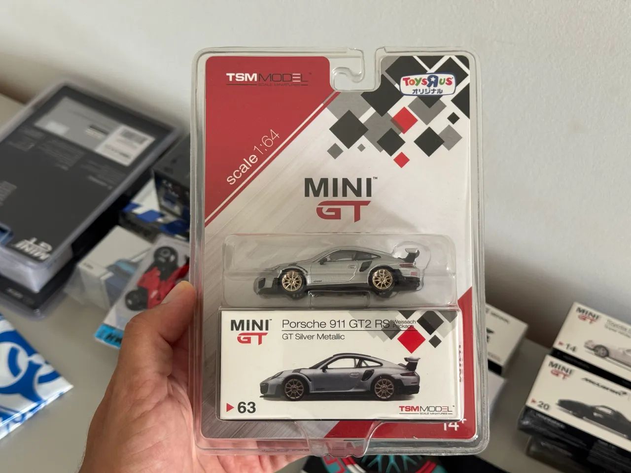 Mini GT 63 - Porsche 911 GT2 RS cartela Toysrus (LACRADA