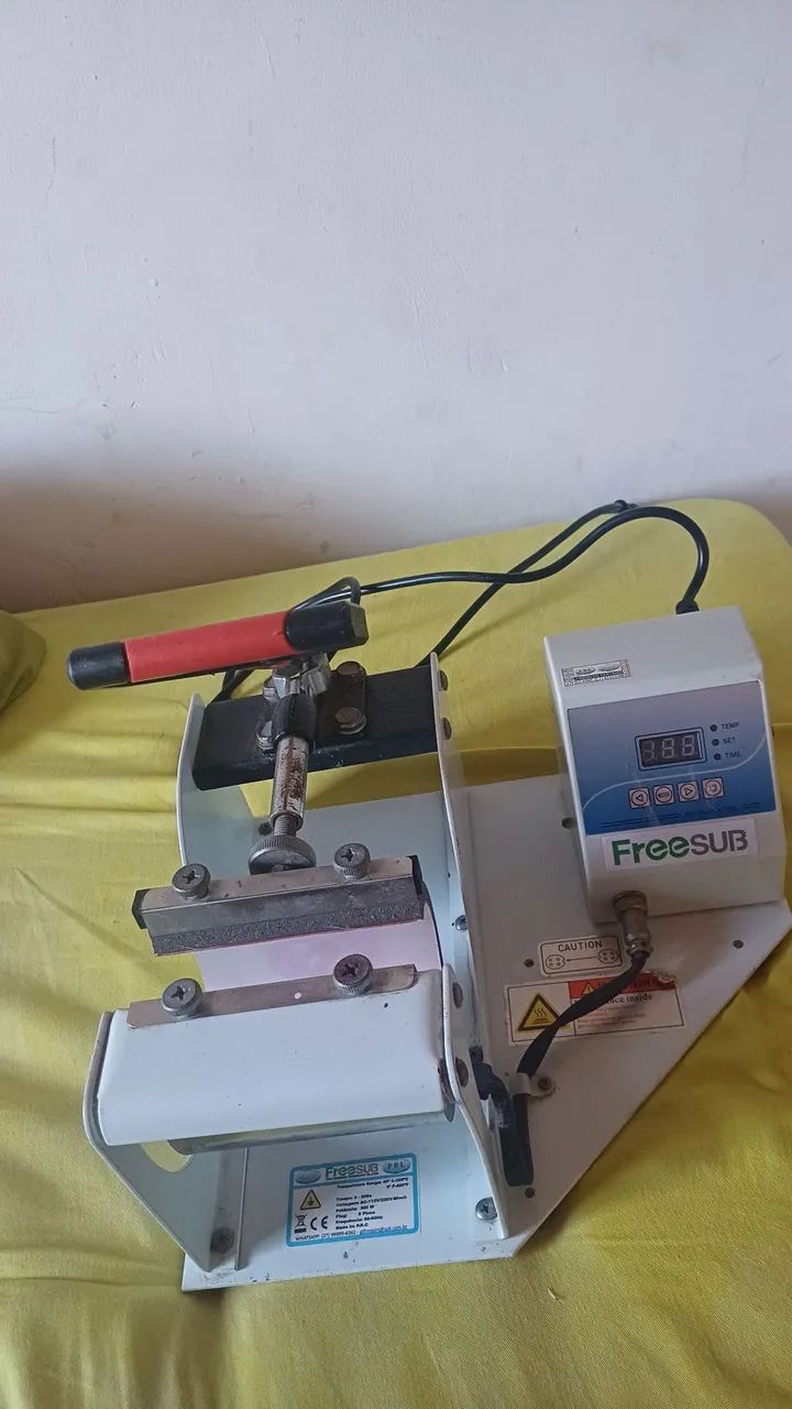 Máquina de canecas 