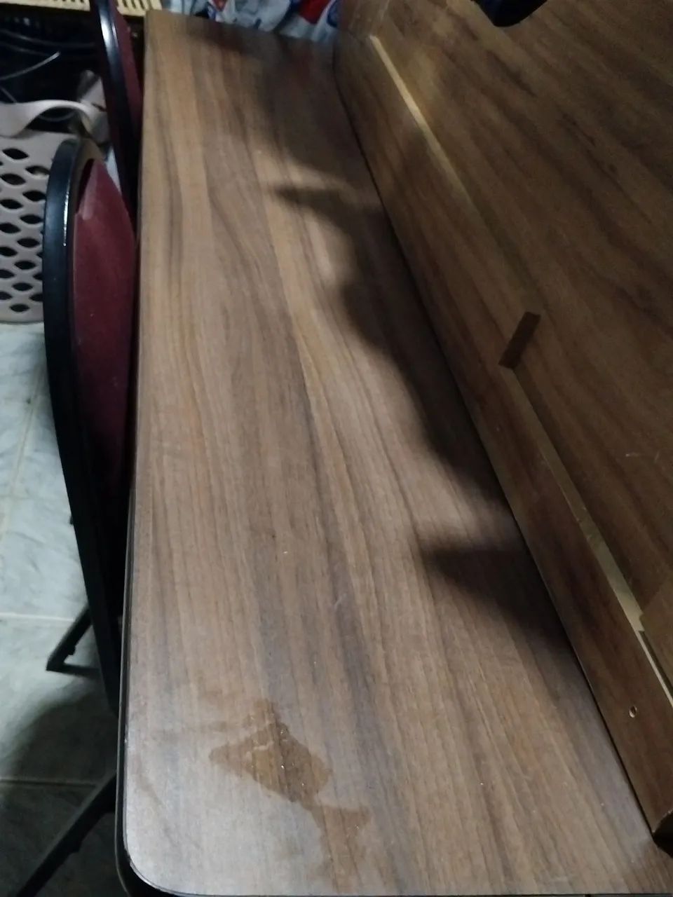 Office desk with three red chairs
