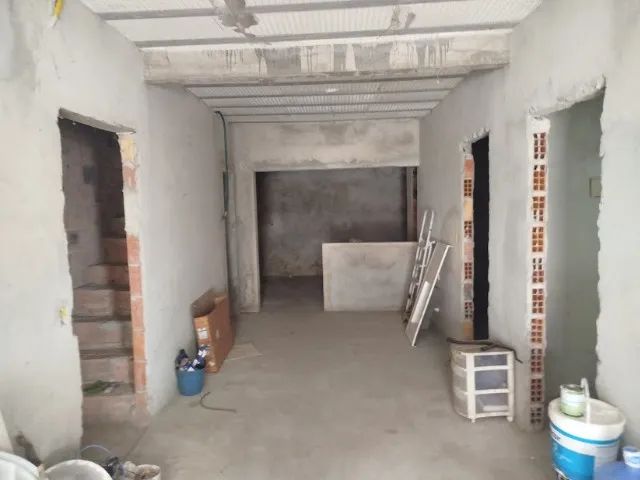 Prédio com duas casas duas garagens e dois salões - Foto 9