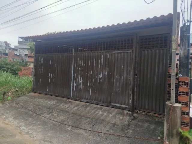 Prédio com duas casas duas garagens e dois salões - Foto 3