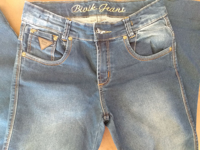 calça jeans tamanho 14