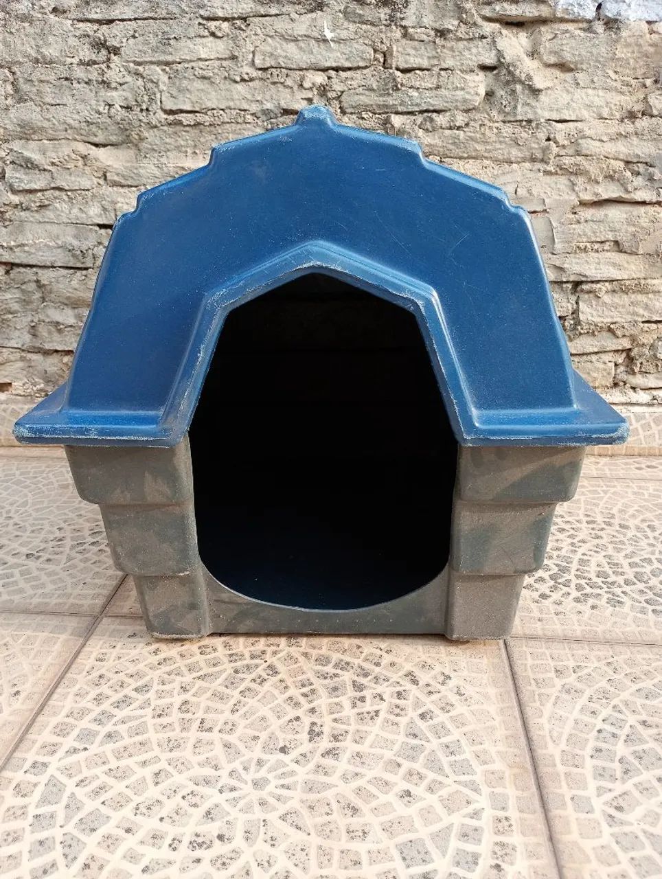 Casinha para cachorro de pequeno porte.