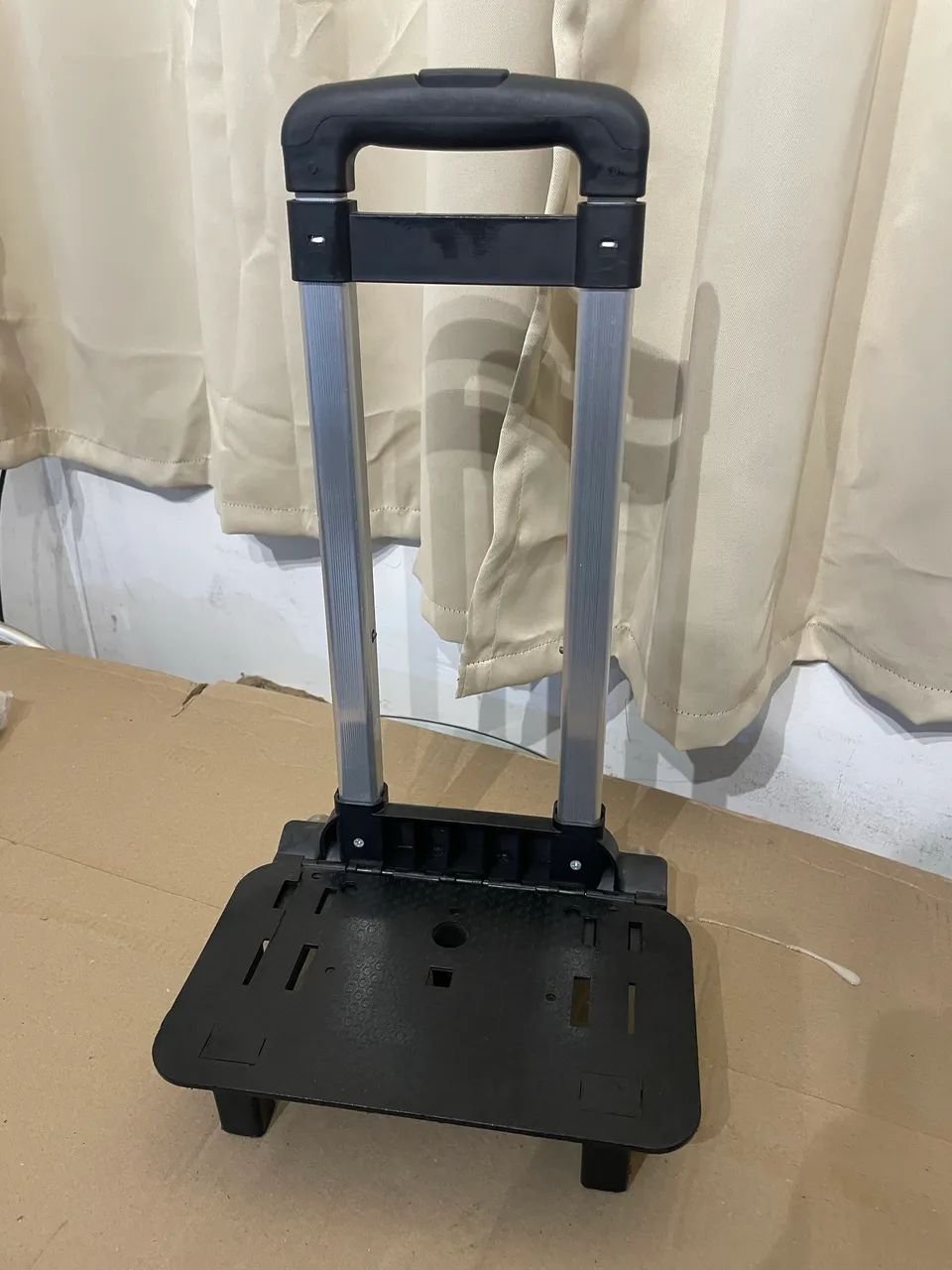 Suporte pra mochila com rodinhas 