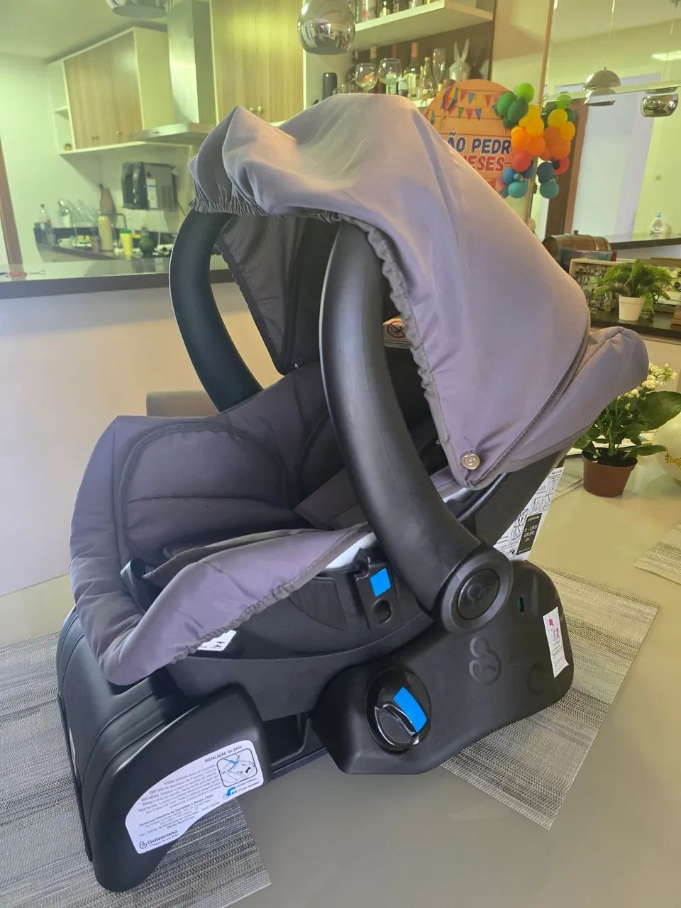 Bebê conforto com suporte