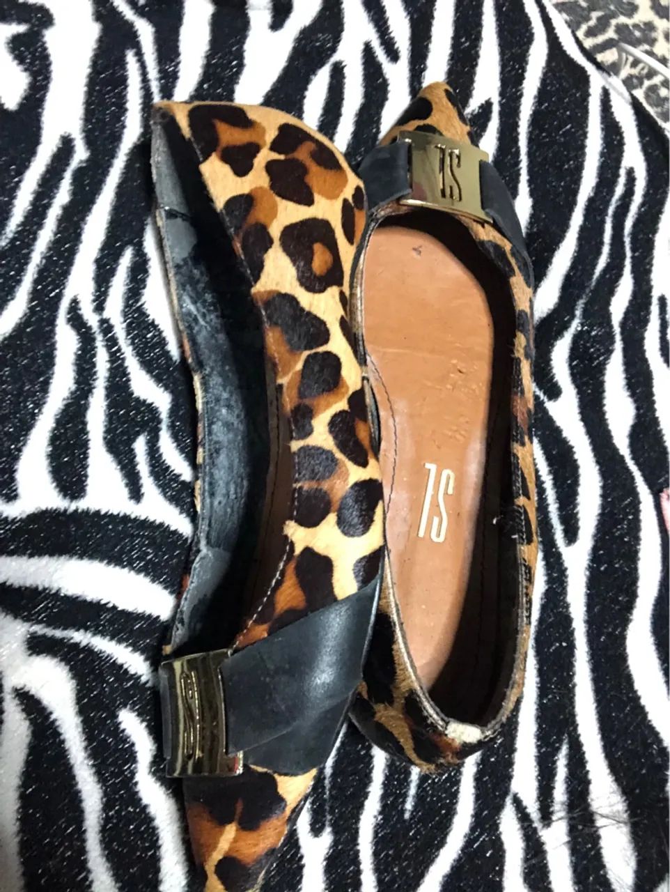 Sapatilhas estilo oncinha.