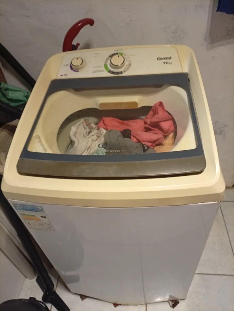 Máquina de lavar com defeito 