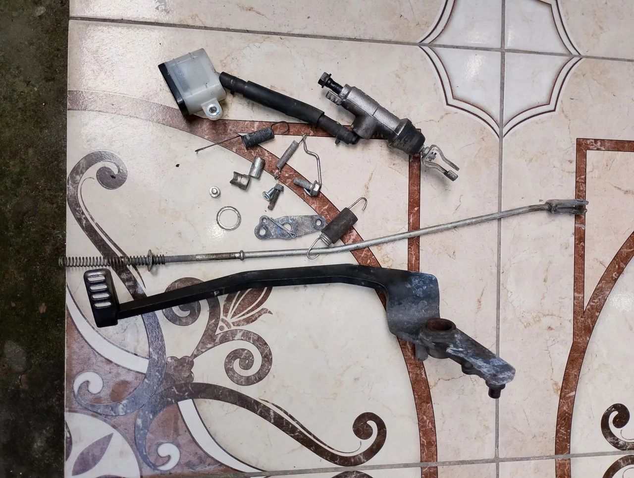 Pedal do freio traseiro titan