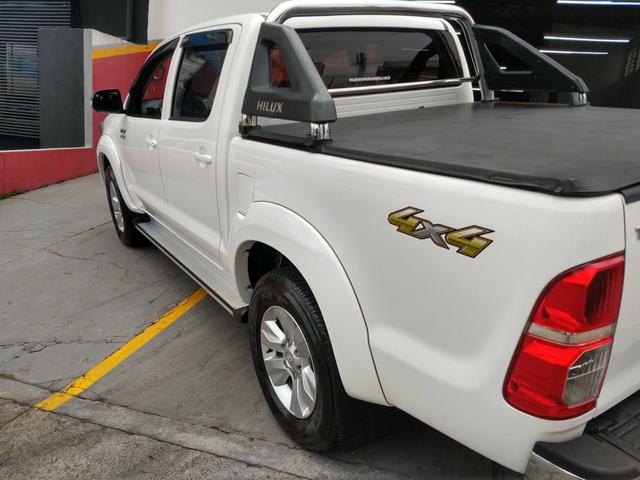 Hilux Srv flex ano 2014 automático - Foto 7