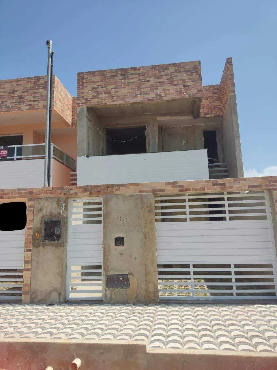 Casa na Coroa do Meio /Rua pública
