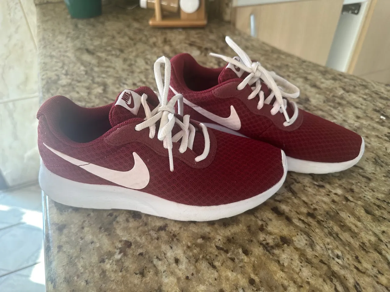 Tênis Nike tajun 35