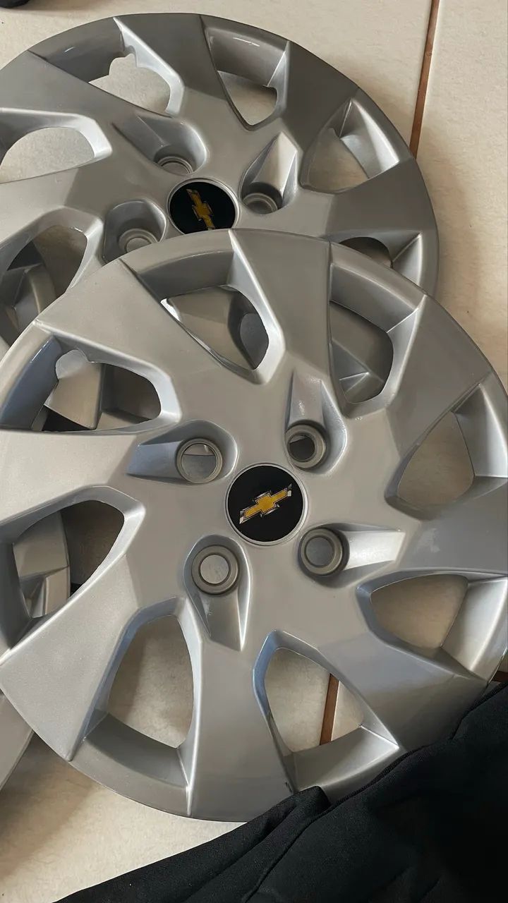 Capa de banco da Chevrolet + calota + coifa de câmbio