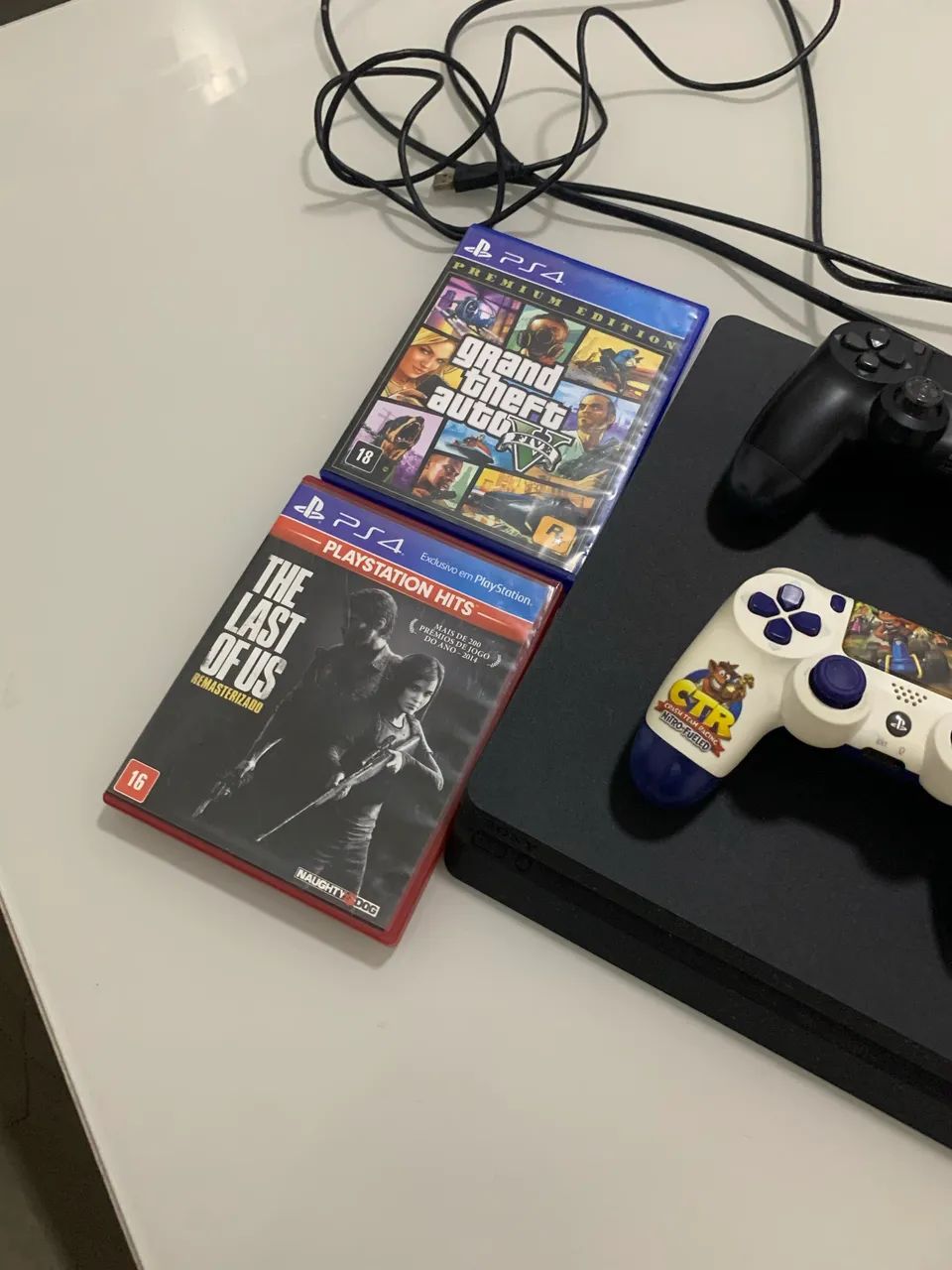 Ps4 slim 1 TB com jogos 