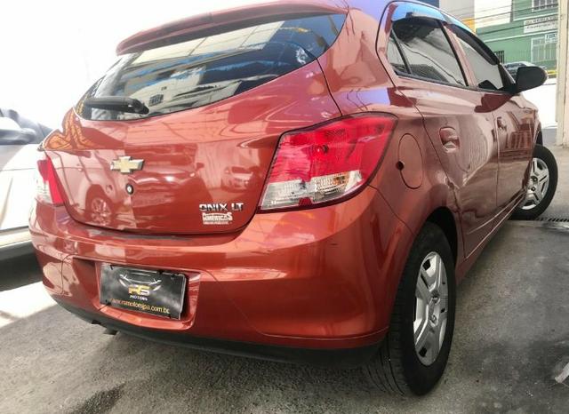 GM Onix LT entrada + 549,00 parcelas fixas - Foto 5