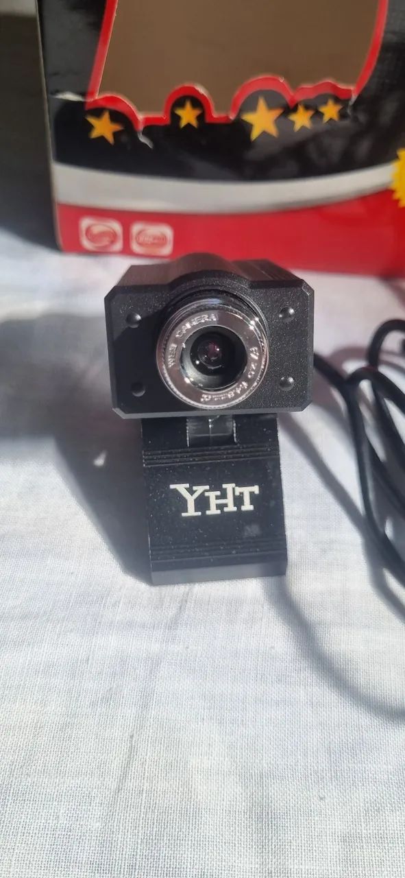 Vendo web cam semi nova 