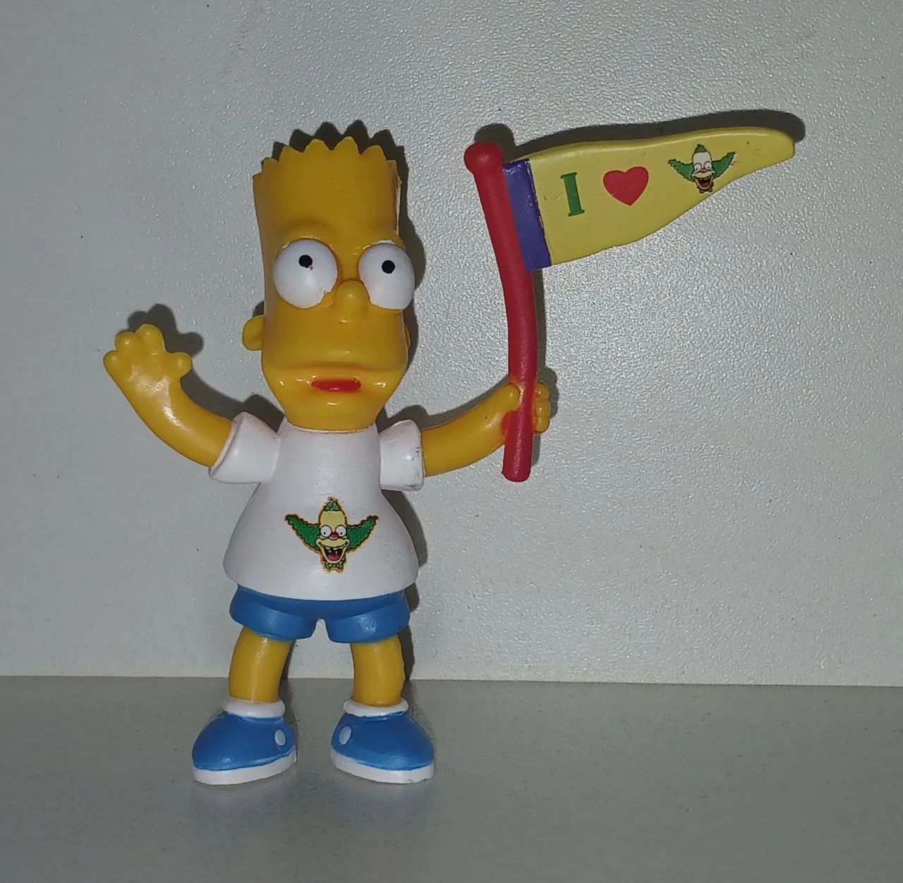 BONECO MINIATURA OS SIMPSONS BART SIMPSON BANDEIRA