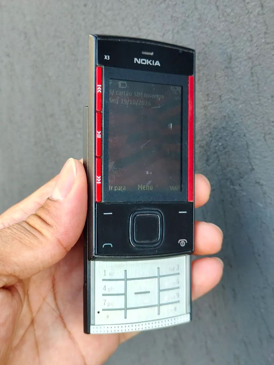 Celular antigo Nokia X3 Slide