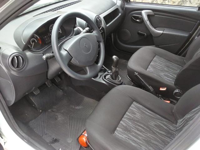 Sandero 2013 expression 1.0,impecável,90mkm,pneus novos,manual e chave copia - Foto 18