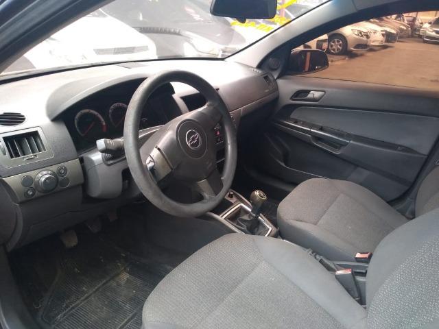 Vectra Sedan 2.0 Expression 2010 preto / manual - completo - flex/gnv - Foto 6