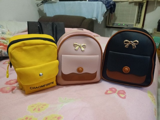 Bolsa Transversal e ou mochilinhas.<br><br>