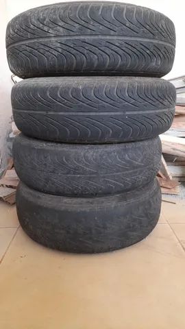 04 Rodas de Ford K, sendo 02 pneus meia vida e 02 mais usados - Foto 2