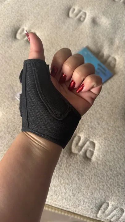 Tala polegar mão esquerda 